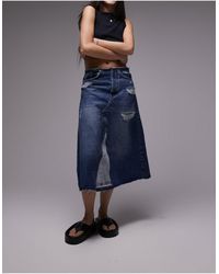 TOPSHOP - Jupe trapèze mi-longue en jean avec taille à bord effiloché et déchirures - moyen - Lyst