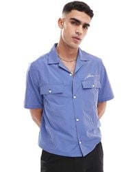 ASOS - Camicia Squadrata Vestibilità Comoda Con Ricamo Sul Petto E Rever A Righe - Lyst