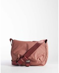 Rains - 16640 Waterproof Bottle Cross Body Bag - Lyst