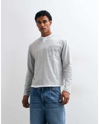 ASOS - Relaxed Double Layer V Neck T-shirt With Chest Pocket And Graphic - Lyst