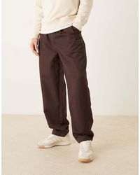 ASOS - Oversized Tapered Fit Trousers With Pleat Detail - Lyst