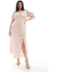 ASOS - Asos design curve - robe mi-longue à imprimé fleuri avec liens noués et manches bouffantes - Lyst