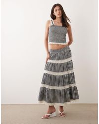 Nobody's Child - – leonor – gestufter maxirock aus baumwolle mit en vichy-karos und spitzenbesatz, kombiteil - Lyst