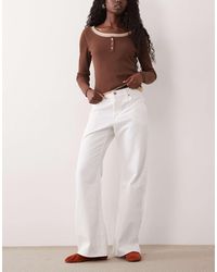 Levi's - Jean bootcut ample mi-long en denim écru - Lyst
