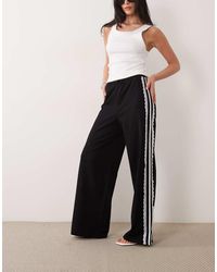 ASOS - Wide Leg joggers With Lace Details - Lyst
