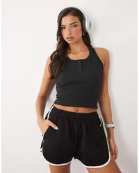 4505 - Seamless Rib Scoop Neck Henley Vest With Racer Back - Lyst