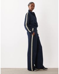 GOOD AMERICAN - Satin Stripe Detail Track Pants - Lyst