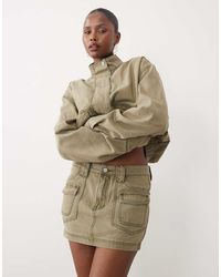 Missy Empire - Missy Empire Denim Pocket Detail Cargo Mini Skirt - Lyst