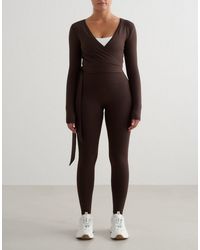 Aim'n - Shape - top cache-cœur sans coutures à manches longues - chocolat - Lyst