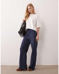 Abercrombie & Fitch - High Rise Wide Leg Logo joggers - Lyst