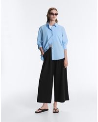Oysho - Soft-Touch Wide-Leg Crop Trousers With Modal And Pleats - Lyst