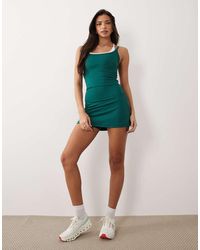 4505 - Active Tennis Double Layer Tank With Cross Strap Back - Lyst