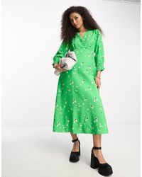 Y.A.S - Vestido midi verde con estampado floral y lazada en la espalda - Lyst