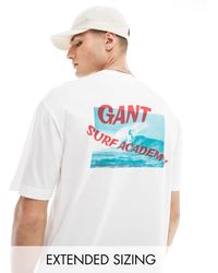 GANT - T-shirt bianca con logo e stampa sul retro a tema surf vestibilità comoda - Lyst