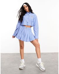 ASOS - Pleated Mini Skirt With Woven Label - Lyst