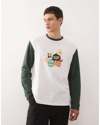 Reclaimed Vintage - Long Sleeve T-shirt With Sticker Graphic And Green Sleeves - Lyst