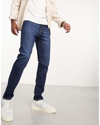 Levi's - Vaqueros Azul Marino De Corte Tapered Slim Con Lavado Oscuro 512 De - Lyst