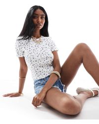 ONLY - Crop Top A Coste Con Fiori Blu - Lyst
