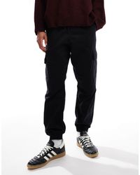 New Look - Pantalon cargo ajusté avec chevilles resserrées - Lyst