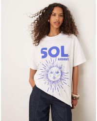 ASOS - Oversized T-shirt With Sol Sun Graphic - Lyst