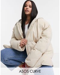 ASOS ASOS DESIGN Curve – Oversize-Pufferjacke aus Jersey mit Kapuze - Natur