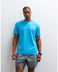 Nike - Camiseta Azul Con Protección Uv Miler Dri-Fit De - Lyst