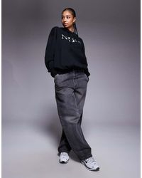 nike mini swoosh oversized cropped sweatshirt in green