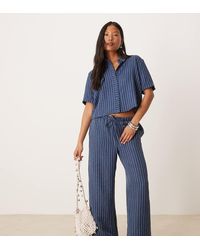 JDY Petite - Pantaloni Con Fondo Ampio Scuro A Righe - Lyst