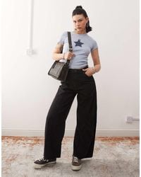 Wrangler - Lichtgewicht Jeans Met Wijde Pijpen, Cowboy Pasvorm En Naden Aan De Voorkant - Lyst