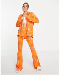Chelsea Peers Lange Pyjamaset Met Giraffenprint - Oranje