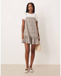 ASOS - Robe courte 2-en-1 à carreaux avec bretelles fines et t-shirt contrastant - tons s - Lyst