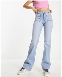 Wrangler - Jeans a zampa lavaggio west coast a vita alta con tasche sul davanti - Lyst