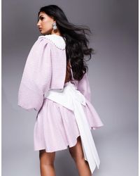 ASOS - Mini-jupe d'ensemble plissée en bouclé et maille avec nœud dans le dos - lilas - Lyst