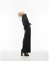 TOPSHOP - Tuta jumpsuit con fondo ampio nera con cuciture a contrasto sul busto - Lyst