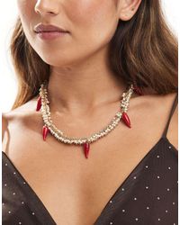 Accessorize - Collana Appariscente Dorata Con Perline E Charm A Forma Di Peperoncino - Lyst