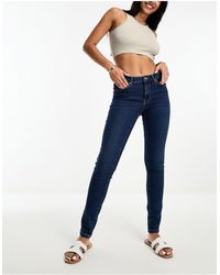 Vero Moda - Skinny Mid Rise Jeans - Lyst