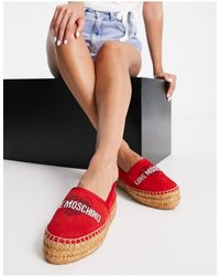 Dames Schoenen voor voor Platte schoenen voor Espadrilles en sandalen Love Moschino Kant Espadrilles Van Kant in het Zwart 