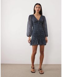 Mango - Teen - robe courte à imprimé fleuri avec manches longues et détails froncés - Lyst