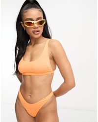 Speedo - Top bikini color pesca con scollo rotondo e spalline multiple - Lyst