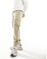 Champion - Pantalones cargo con bajos ajustados - Lyst