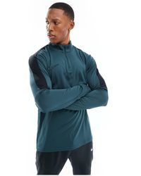 Nike Football - Academy drill - top scuro - Lyst