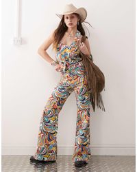 Wrangler - Jean évasé d'ensemble à taille haute avec imprimé coloré style années 70 - Lyst