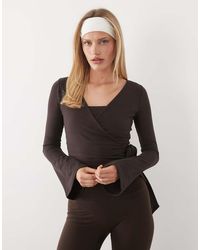 4505 - Ballet Wrap Flared Sleeve Top - Lyst