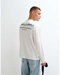 ASOS - Oversized Long Sleeve T-Shirt With Text Graphic - Lyst