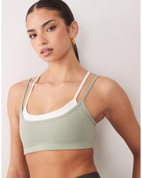 4505 - Double Layer Strappy Sports Bra With Removable Padding And Adjustable Straps - Lyst