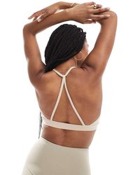 agon® - Strappy Sports Bra - Lyst