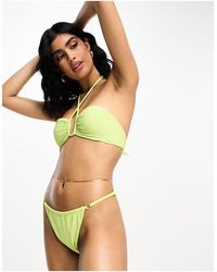 Hunkemöller - Fiji - top bikini a fascia con ferretto lime - Lyst