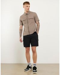 River Island - Skinny Fit Stretch Cargo Shorts - Lyst