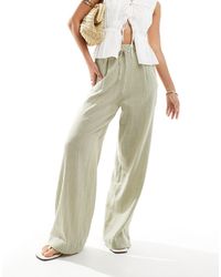 Bershka - Pantalon texturé style rustique en lin avec liens à la taille - kaki clair - Lyst