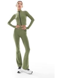 WeWoreWhat - Active Low Rise Bootcut leggings - Lyst
